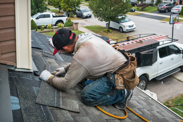 Professional Roofing technician working in Pen Argyl, PA